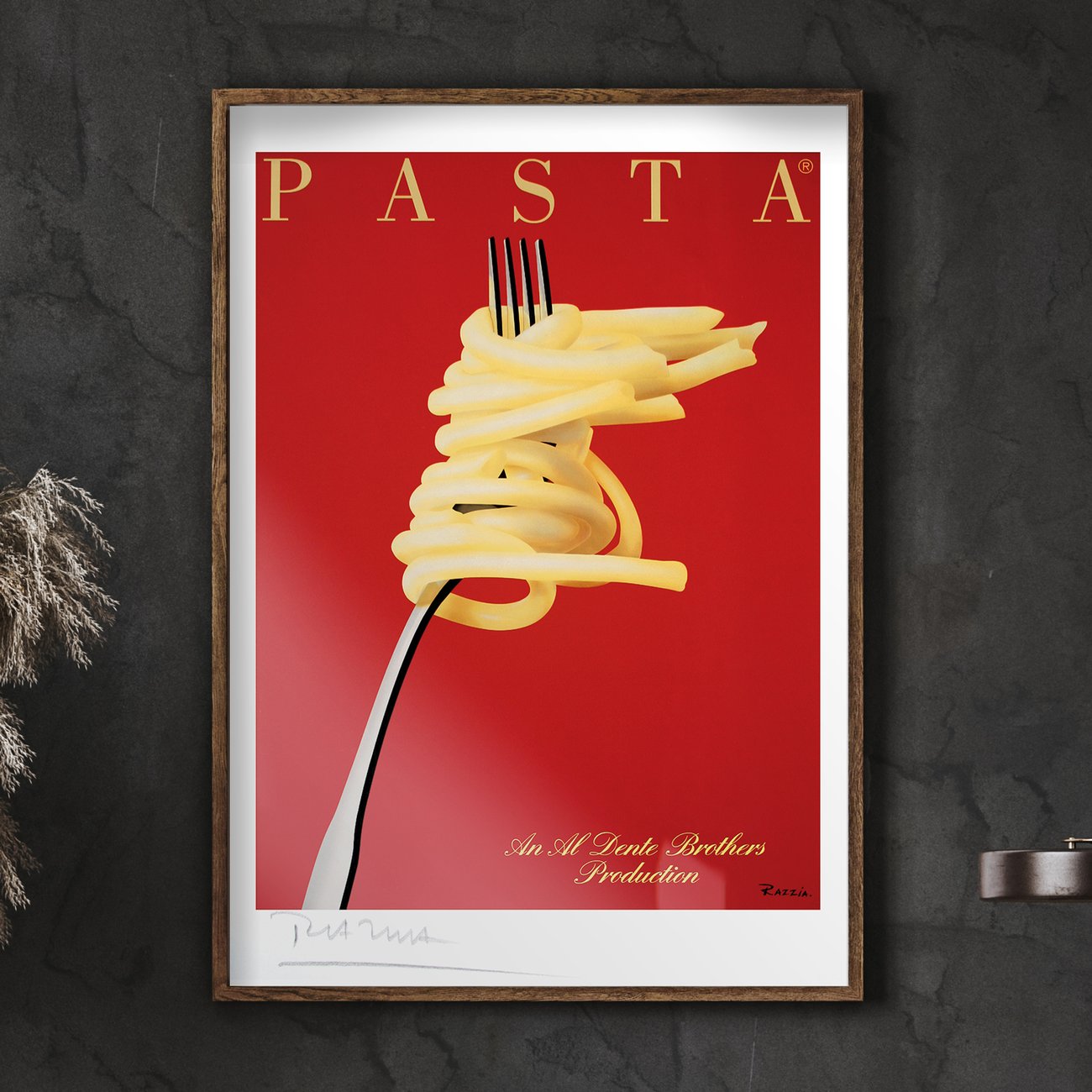 A striking minimalist poster featuring a close-up of a silver fork twirling a perfect bundle of pasta against a vivid red background. The bold composition and clean lines create a powerful visual contrast, turning a simple culinary subject into an elegant piece of modern pop art. The word PASTA appears across the top in sleek golden letters, while the phrase &ldquo;An Al Dente Brothers Production&rdquo; is elegantly scripted at the bottom, adding a cinematic flair. This artwork combines humor, style, and sophistication&mdash;an unmistakable example of Razzia&rsquo;s ability to elevate everyday objects into timeless icons of design.