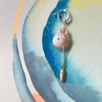 Image 1 of pearl and feather charm
