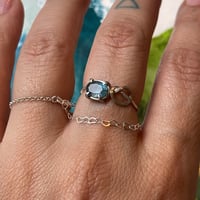Image 1 of tiny blue knot ring