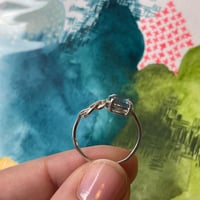 Image 4 of tiny blue knot ring