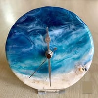 Image 1 of 'Sea-D' shelf clock with stand.