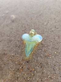 Image 2 of Cfl reactive yoshi shark tooth pendant.