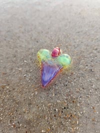 Image 1 of Multi color shark tooth pendant.