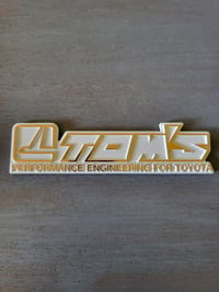 Image 1 of Tom's Aluminum Emblem 