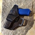 Glock G17 Blacked out avenger holster.