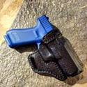 Glock G17 Blacked out avenger holster.