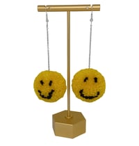 Image 3 of Smiley face pom pom earrings