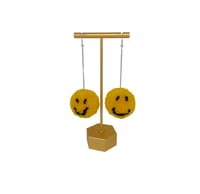 Image 1 of Smiley face pom pom earrings