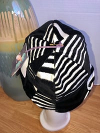 Image 3 of H.O.D. Reversible Black & Cream Velvet, Reverse Side Red and Black Houndstooth Woven Fabric  
