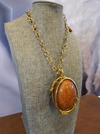 Image 1 of The Brenton chain. (in gold stone) 