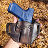 Glock G19 Urban Camo and Grey ruff out pancake holster.