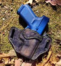Image 3 of Glock G19 Urban Camo and Grey ruff out pancake holster.