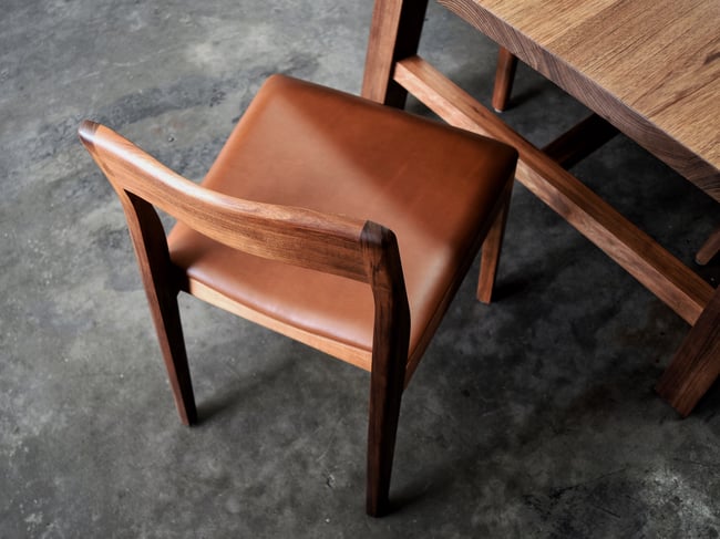 ROSE DINING CHAIR IN TASMANIAN BLACKWOOD WITH AN UPHOLSTERED LEATHER SEAT