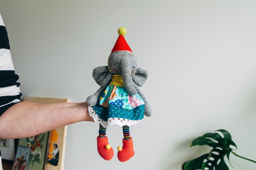 Image of Evelyn - Sculpted Sock Elephant, wool filled and weighted with removable clothes