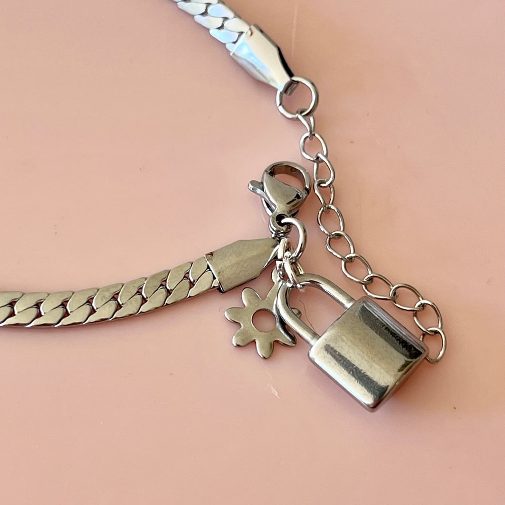Image of Snake Chain Bracelet with lock and flower