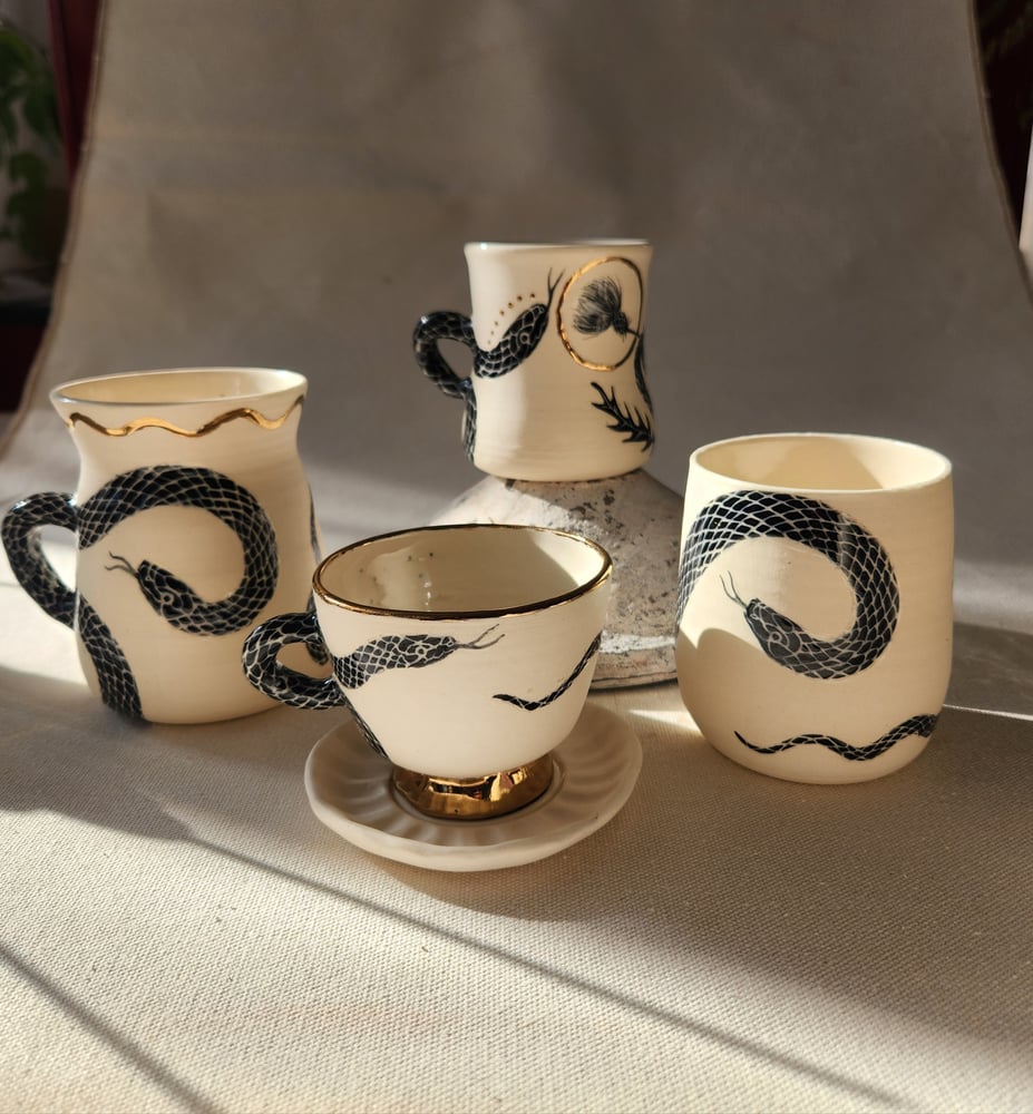 Image of Petite snake teacup & saucer
