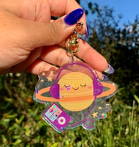 Image 3 of "Planet Shakira" Keychain | Kawaii Space