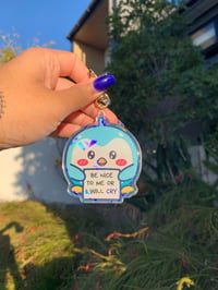 Image 2 of "Be Nice To Me Or I Will Cry" Penguin Star Holo Keychain