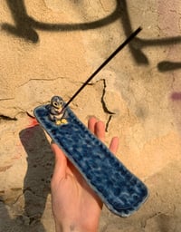Image 1 of fishing penguin incense holder 