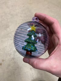 Image of Tree in an ornament purple with blue sparkle spiral 