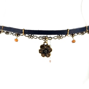 Image of Black Leather and Brass Choker with Flower Charm