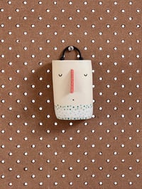 Image of Little Face – hanging ceramic wall vessel