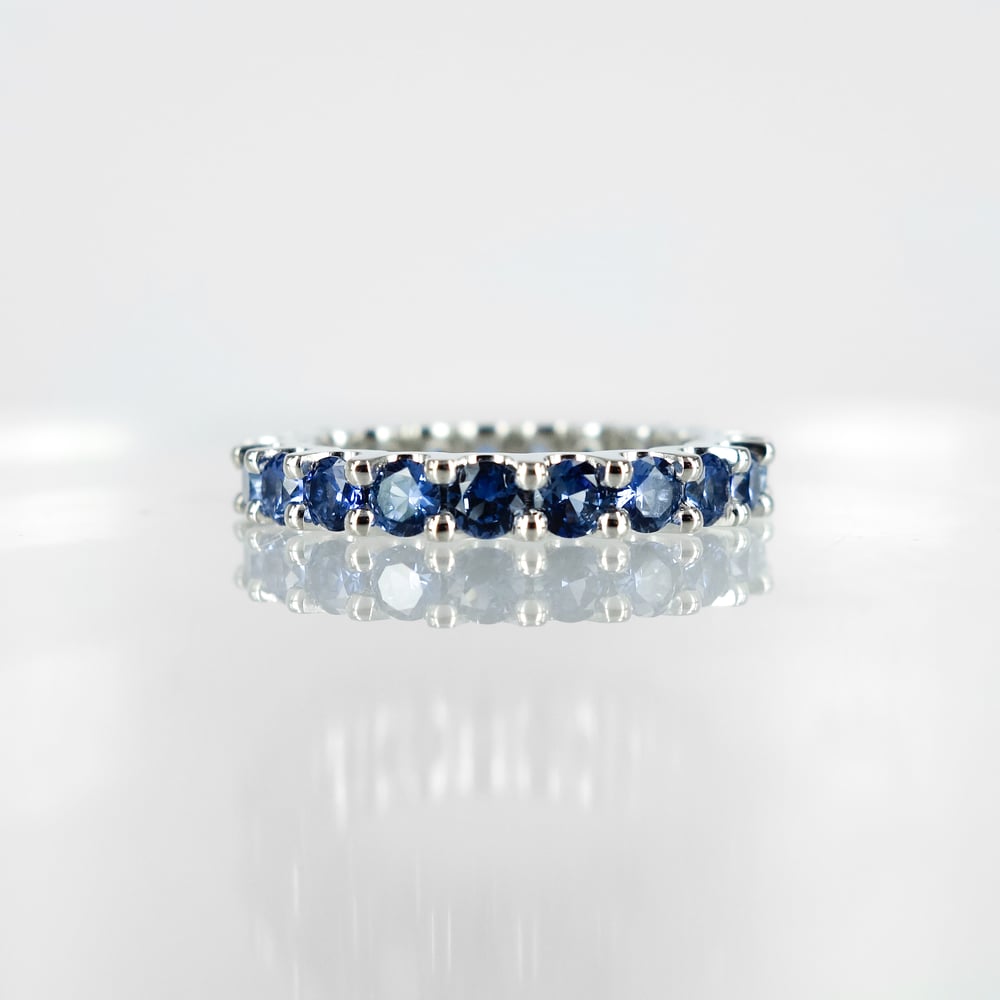 Image of 18ct white gold Sapphire full circle set ring. PJ6015
