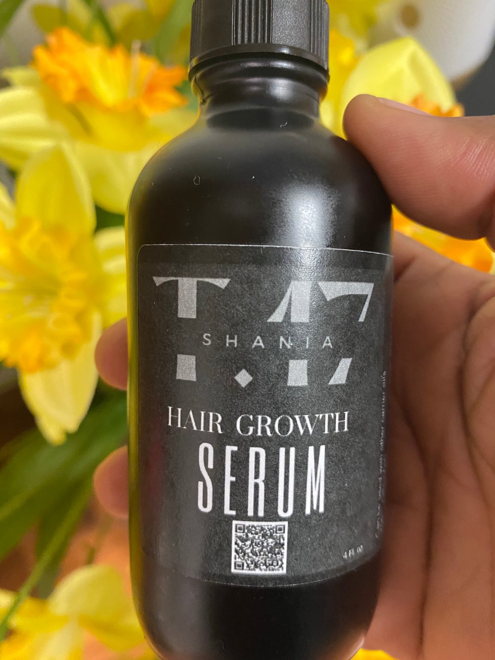 Image of Shania T.17  4 Fl. oz (Potent Serum) to add to all your hair care routine products 