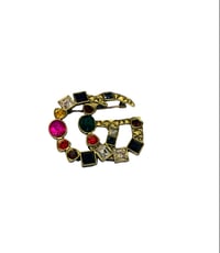 Image 1 of Multifaceted G Pin