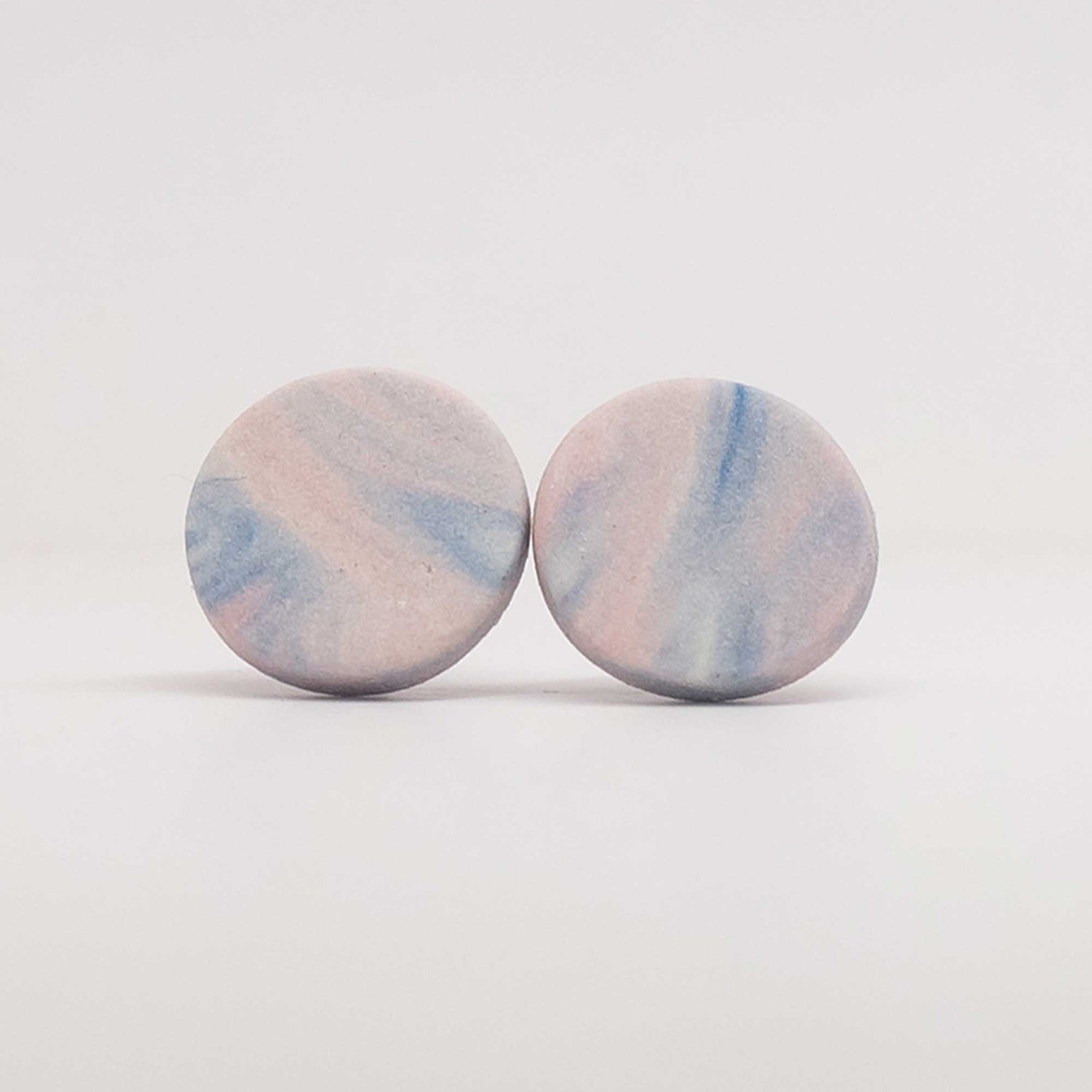 Image of Handmade Australian porcelain stud earrings - soft pink and denim blue swirl