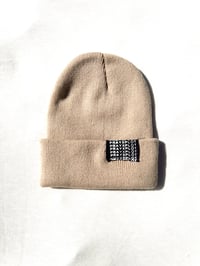 Image of head on straight beanie in tan