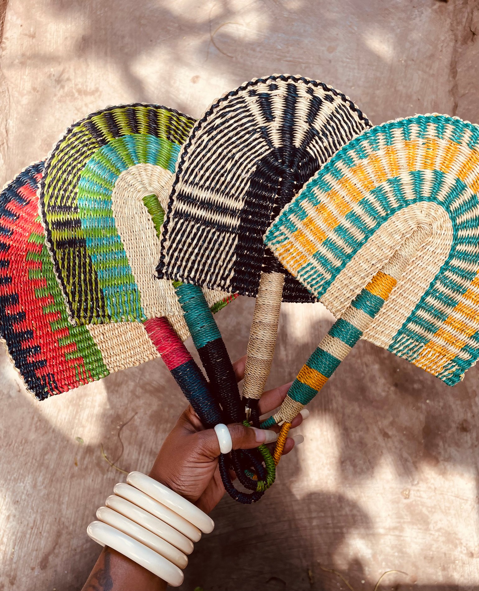 Image of WHOLESALE- Hand Woven Bolga Fans (50 pieces)