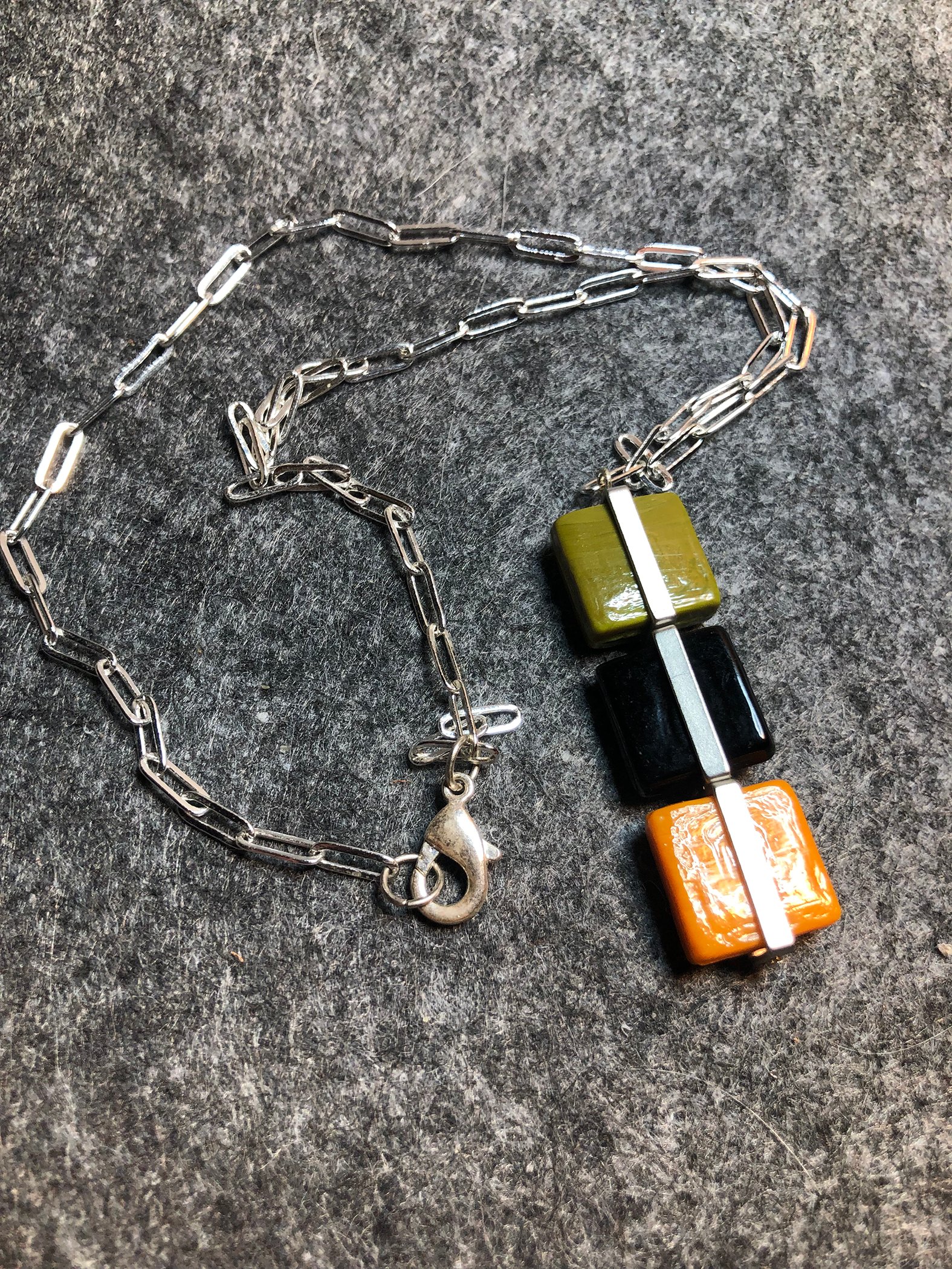 Image of Green black and orange pendant