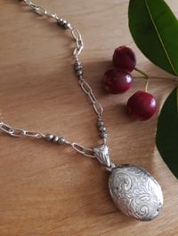 Image 4 of 5HD Engraved Oval Sterling Locket with Pyrite