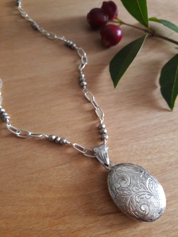Image of 5HD Engraved Oval Sterling Locket with Pyrite
