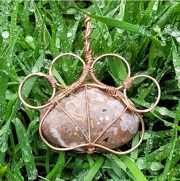 Image of Wire Wrapped Orbicular Jasper Dog Paw Pendant | Copper Wire Art | Heart Chakra Crystal