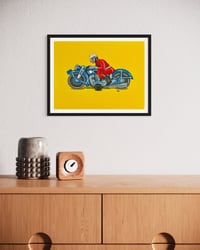 Image 4 of Vintage Toy Motorcycle with Yellow Background