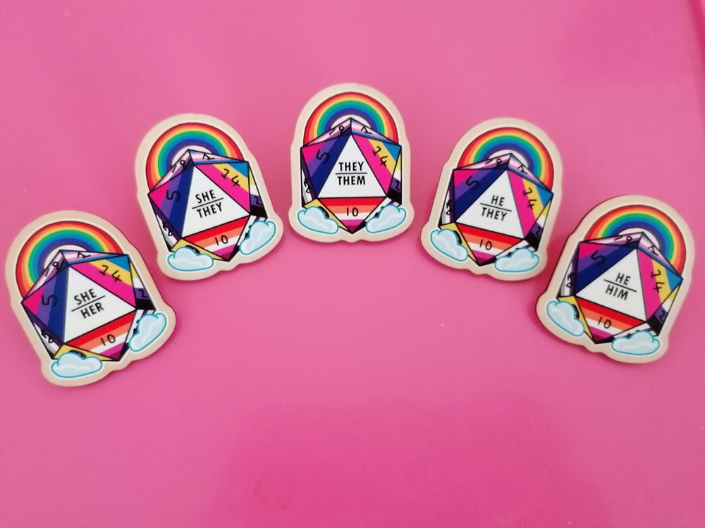 Image of Wooden D20 Pronoun Pins!