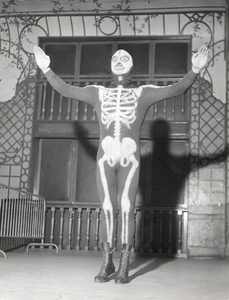 Image of Reporters Associés: wrestler with skeleton suit, France ca. 1960