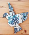 White and blue floral bird