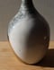 Image of thin neck criss-cross vase