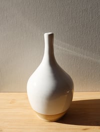 Image 1 of white thin neck vase