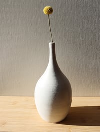 Image 2 of matte white textured thin neck vase