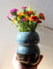 Image of blue and brown hourglass vase