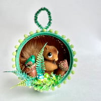 Image 1 of Squirrel & Little Green Bird