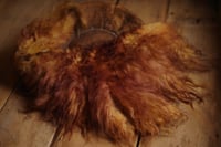 Image 1 of brown fluffy natural felted fur