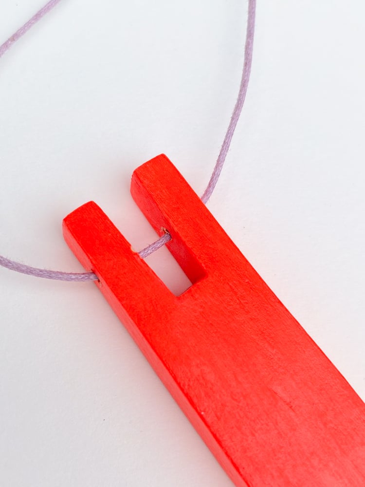 Image of Bright red wooden pendant 