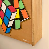 Image 2 of Rubik’s Cube on Drawer
