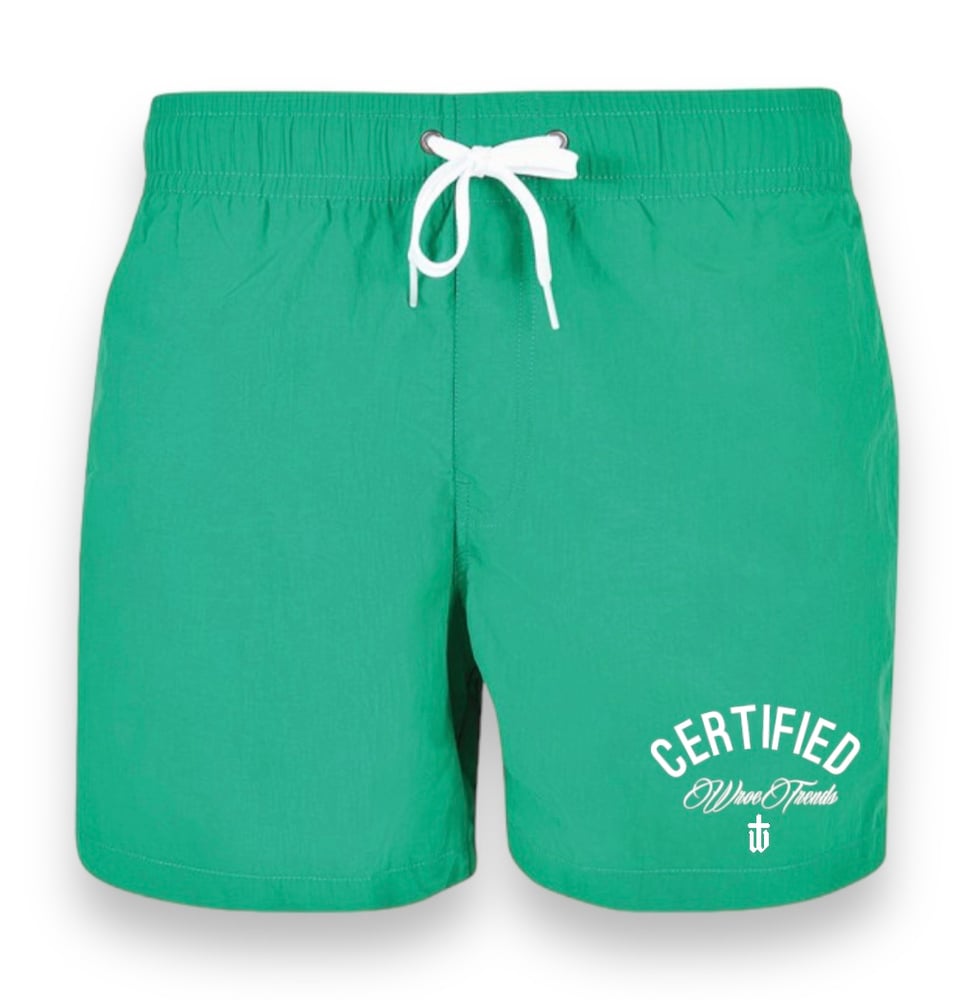 Image of GREEN SWIM SHORTS