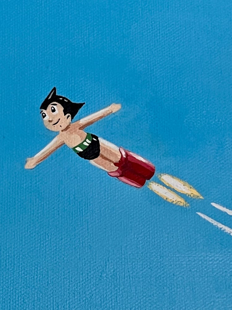 Image of Astro Boy Over A Storm